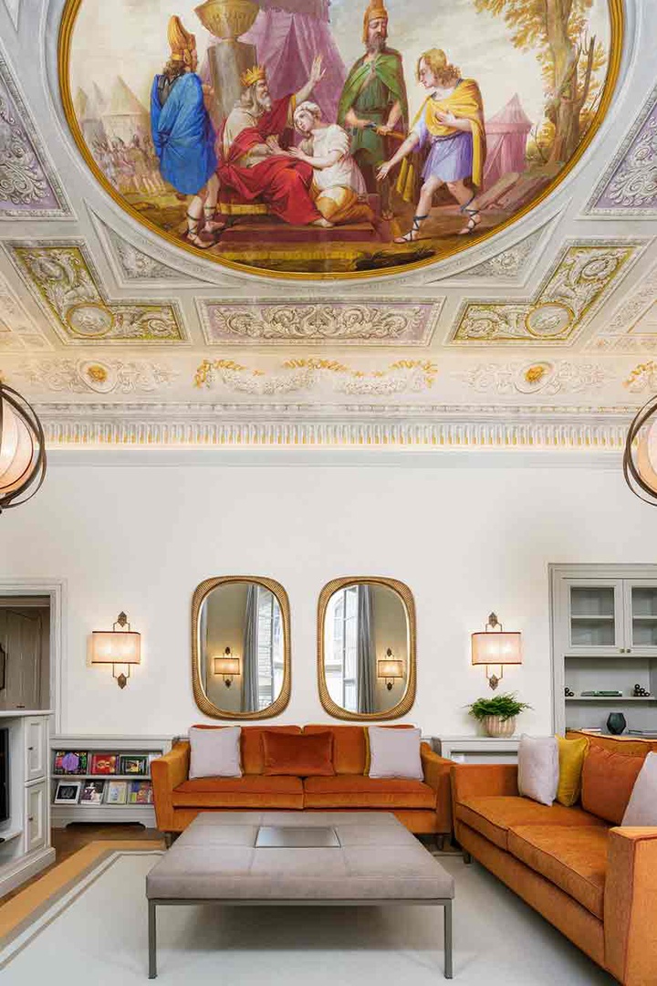 Admire the stunning frescoed ceiling.