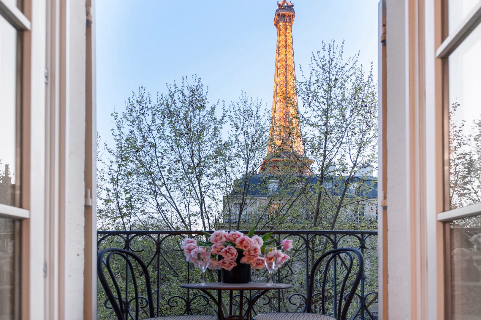 Watch the Eiffel Tower light up at sunset.