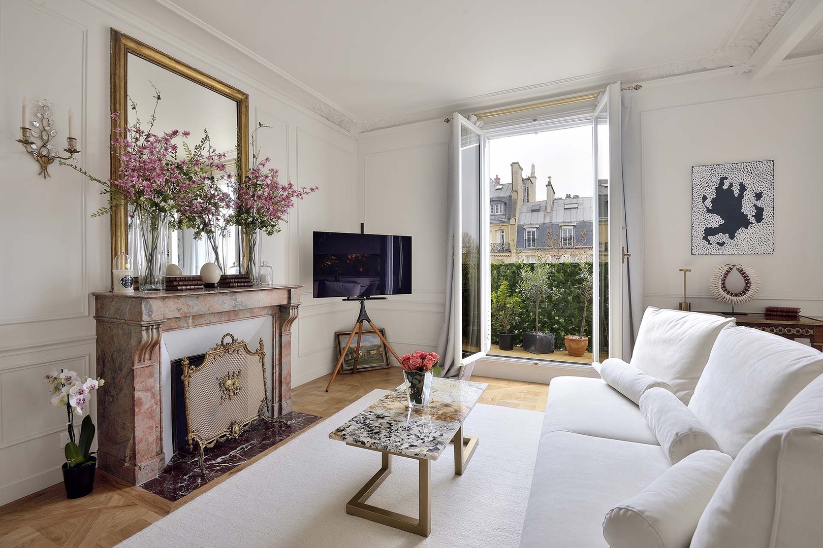 You'll love the views overlooking an elegant tree-lined boulevard.