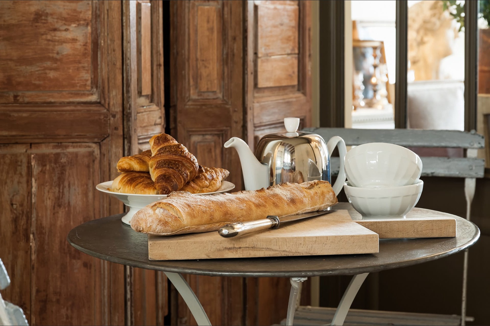 Start your day with a typical Parisian breakfast of croissants, baguettes and coffee!