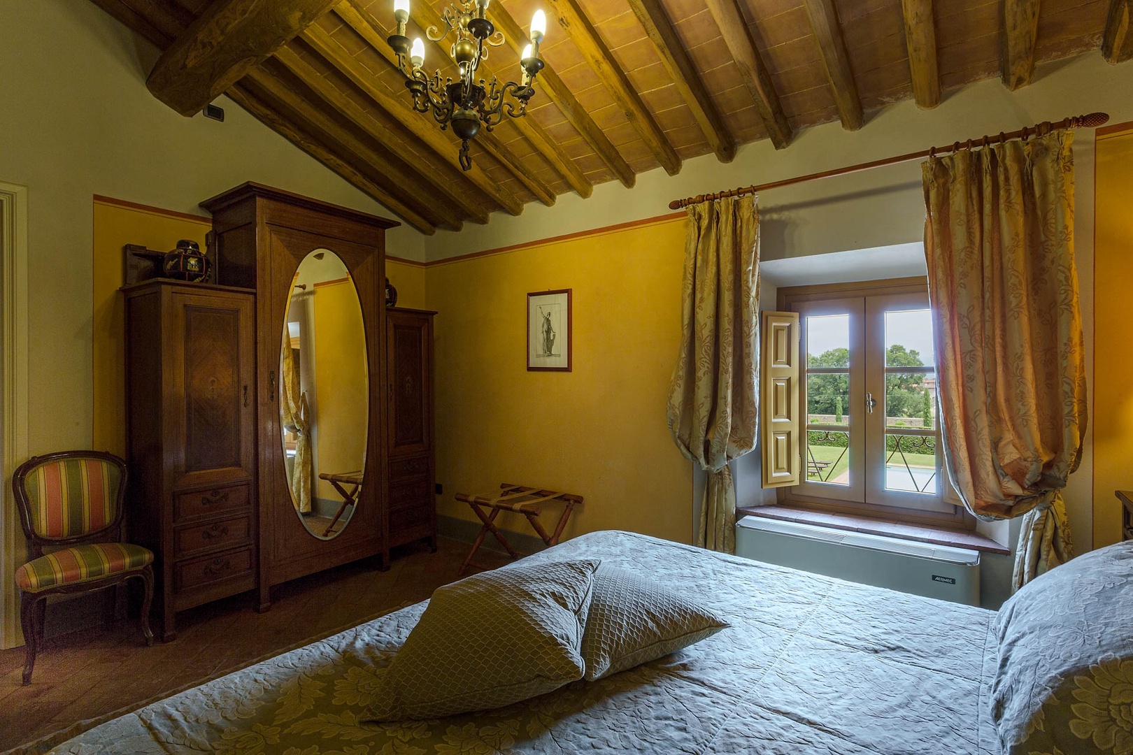 Bedroom overlooks lush landscape