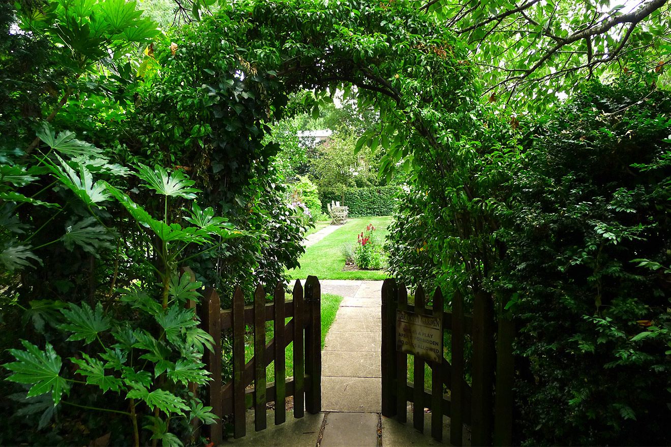 A secluded entrance to the shared garden