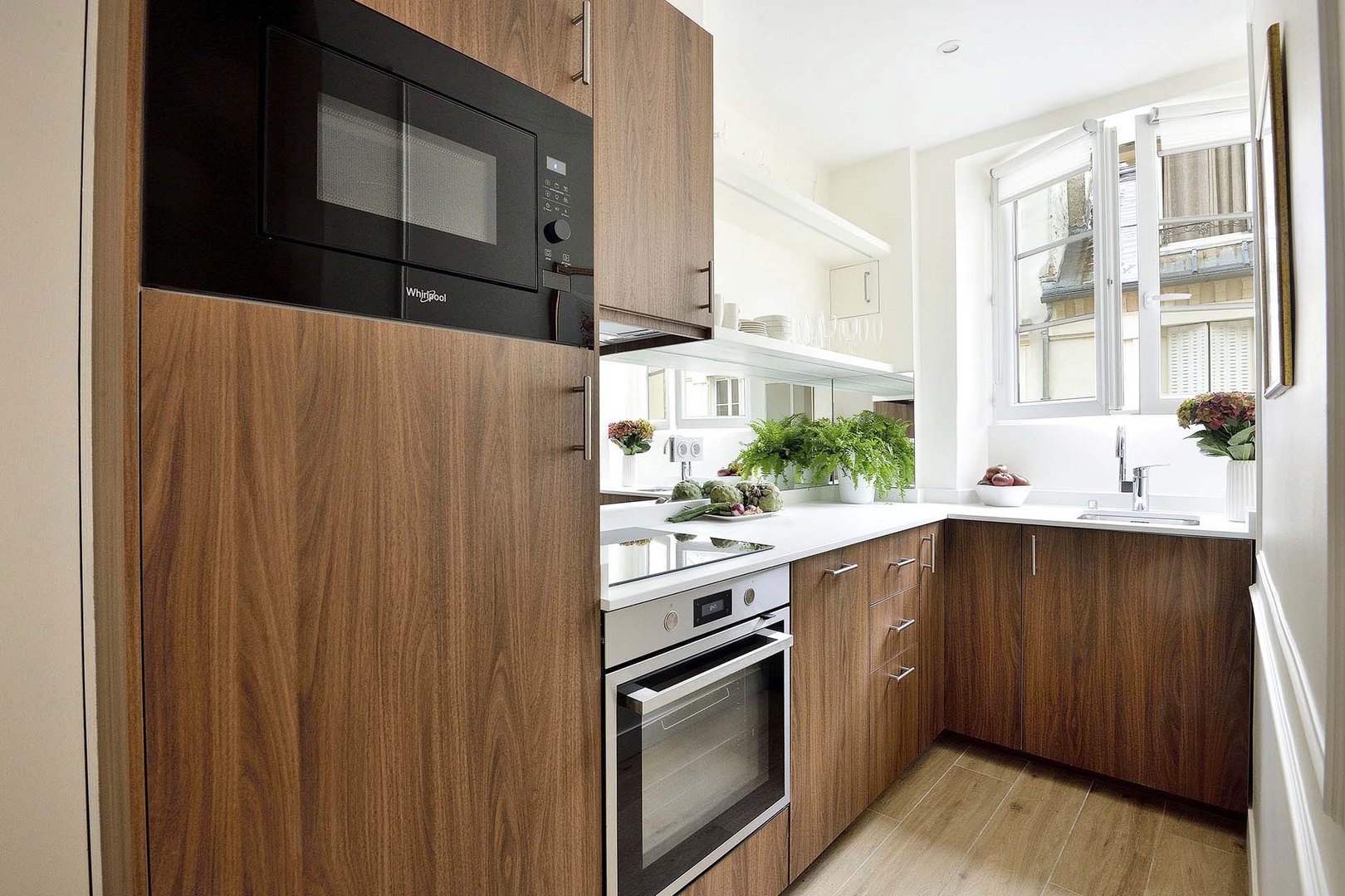 Lots of light and modern appliances in the kitchen.