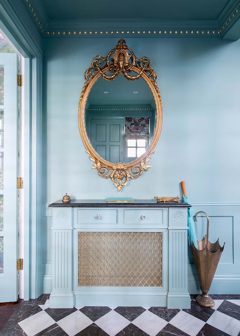 A stunning antique mirror welcomes you to Georgiana.