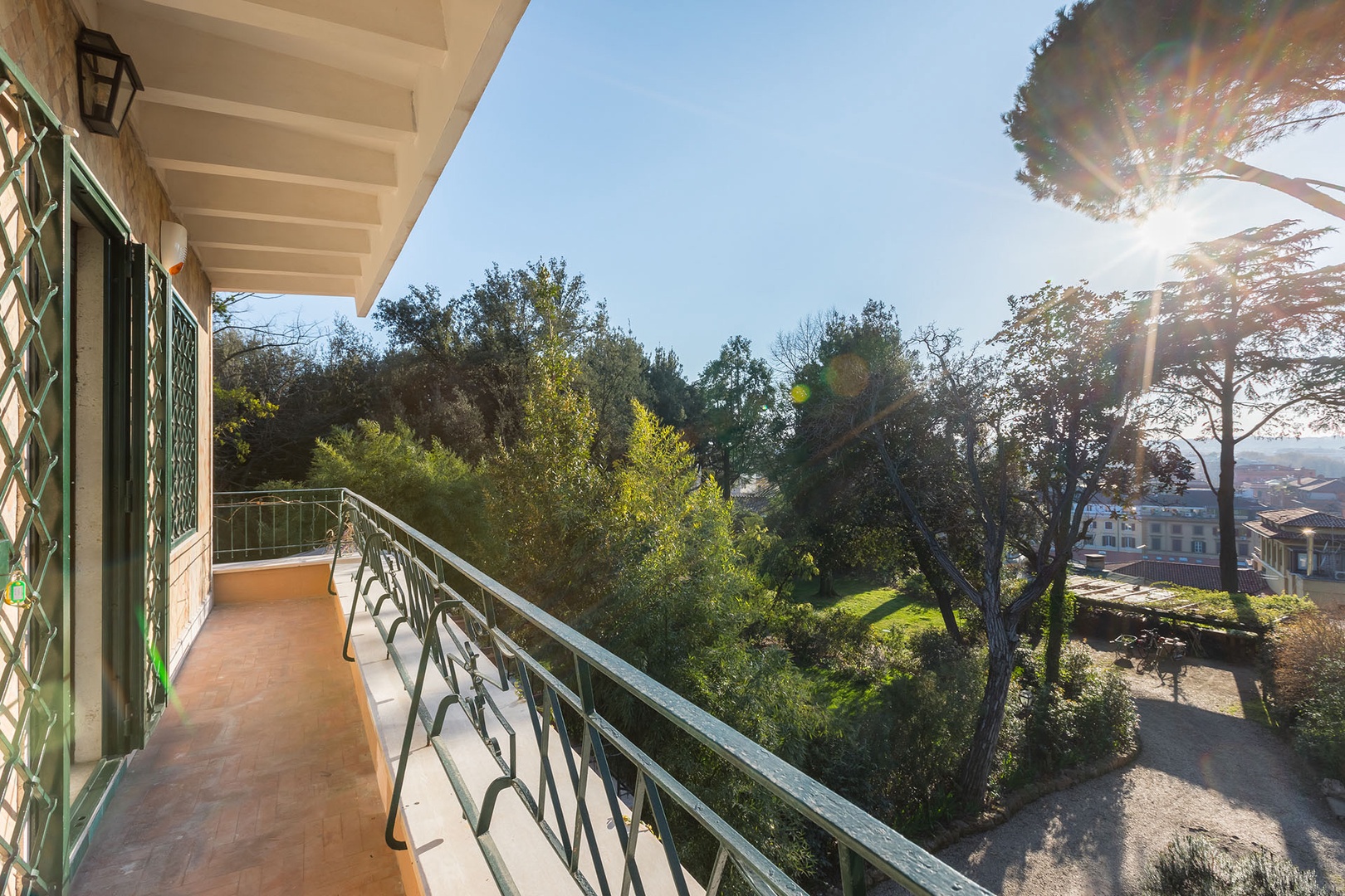 Balcony off bedroom 3 has resplendent views of the garden and city.