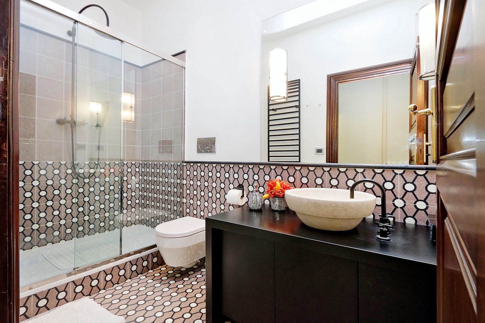 Clean, modern, bathroom 1...great tiles!