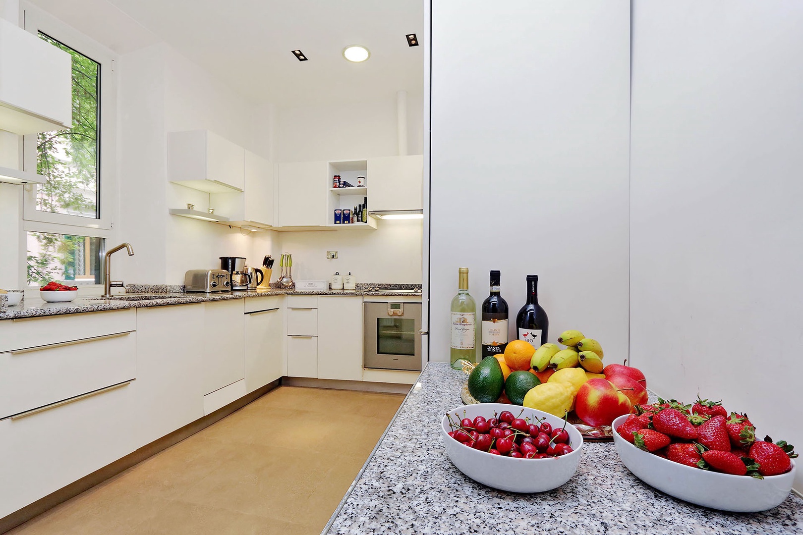 Sleek, clean and bright kitchen.