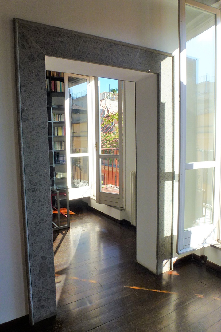 The study adjoins the living room area and has its own French doors out to the balcony.