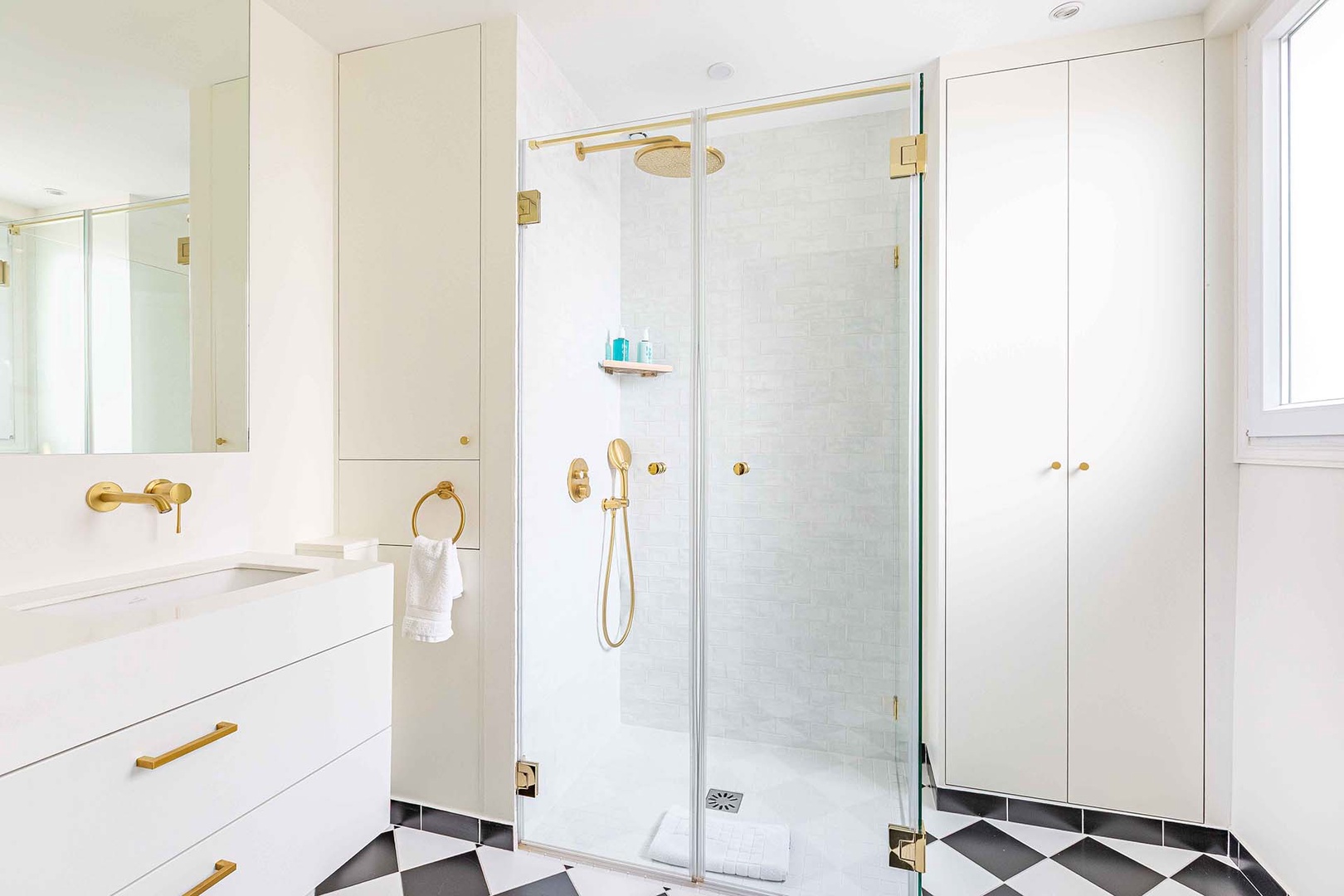 Spacious shower and beautiful light in bathroom 1.