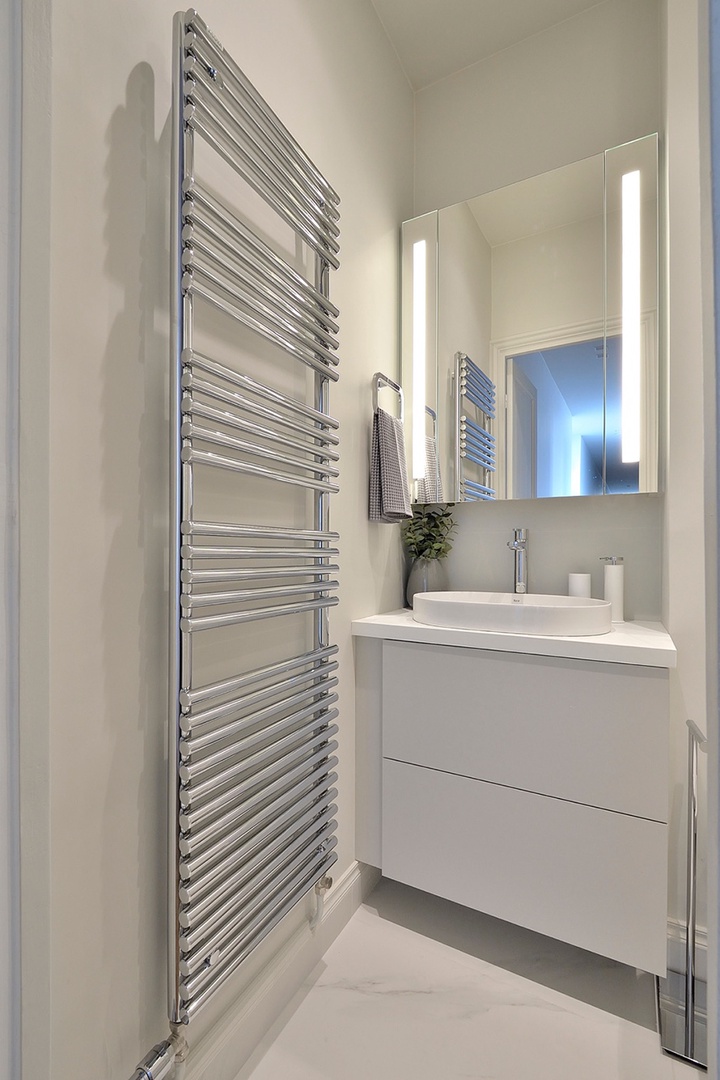 One of two full bathroom near all three bedrooms.