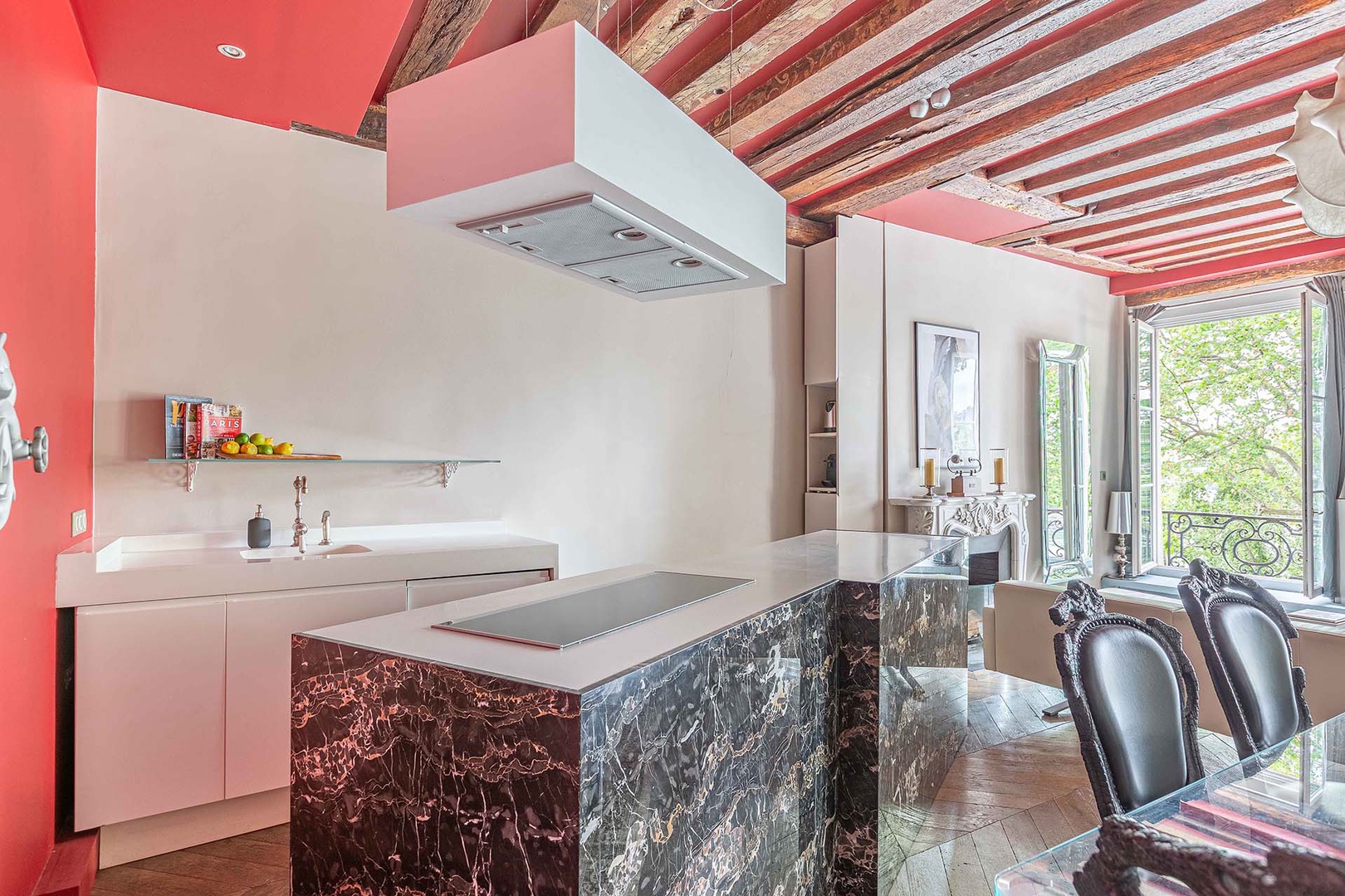 The cleverly designed kitchen keeps everything neatly out of sight.