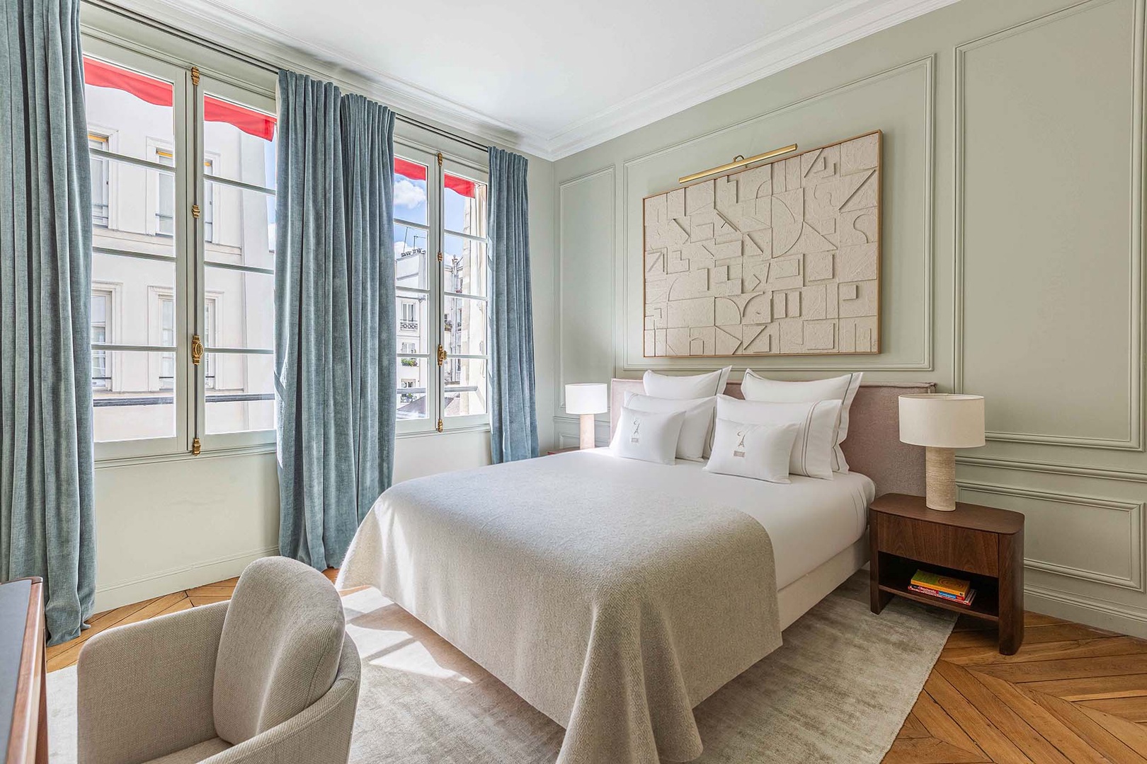 Beautiful bedroom 2 with large windows and sun awnings.