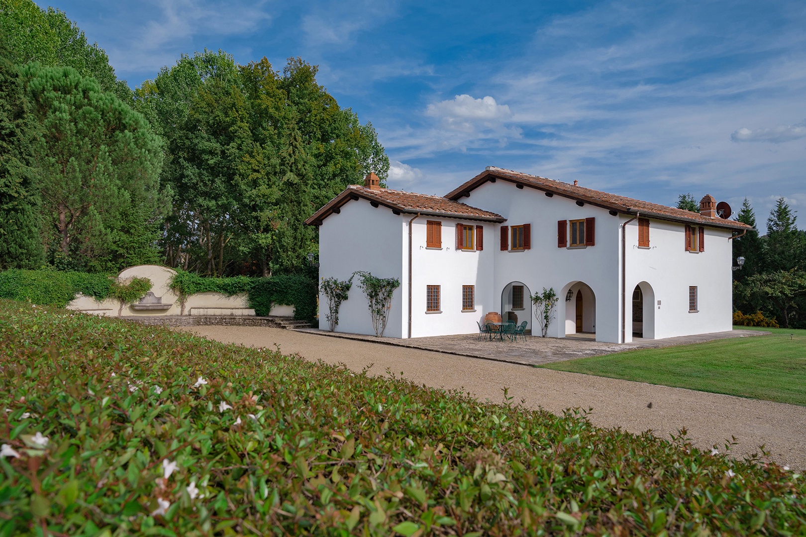 Villa Passera is a classic rustic Italian country home with a private pool and beautiful gardens.