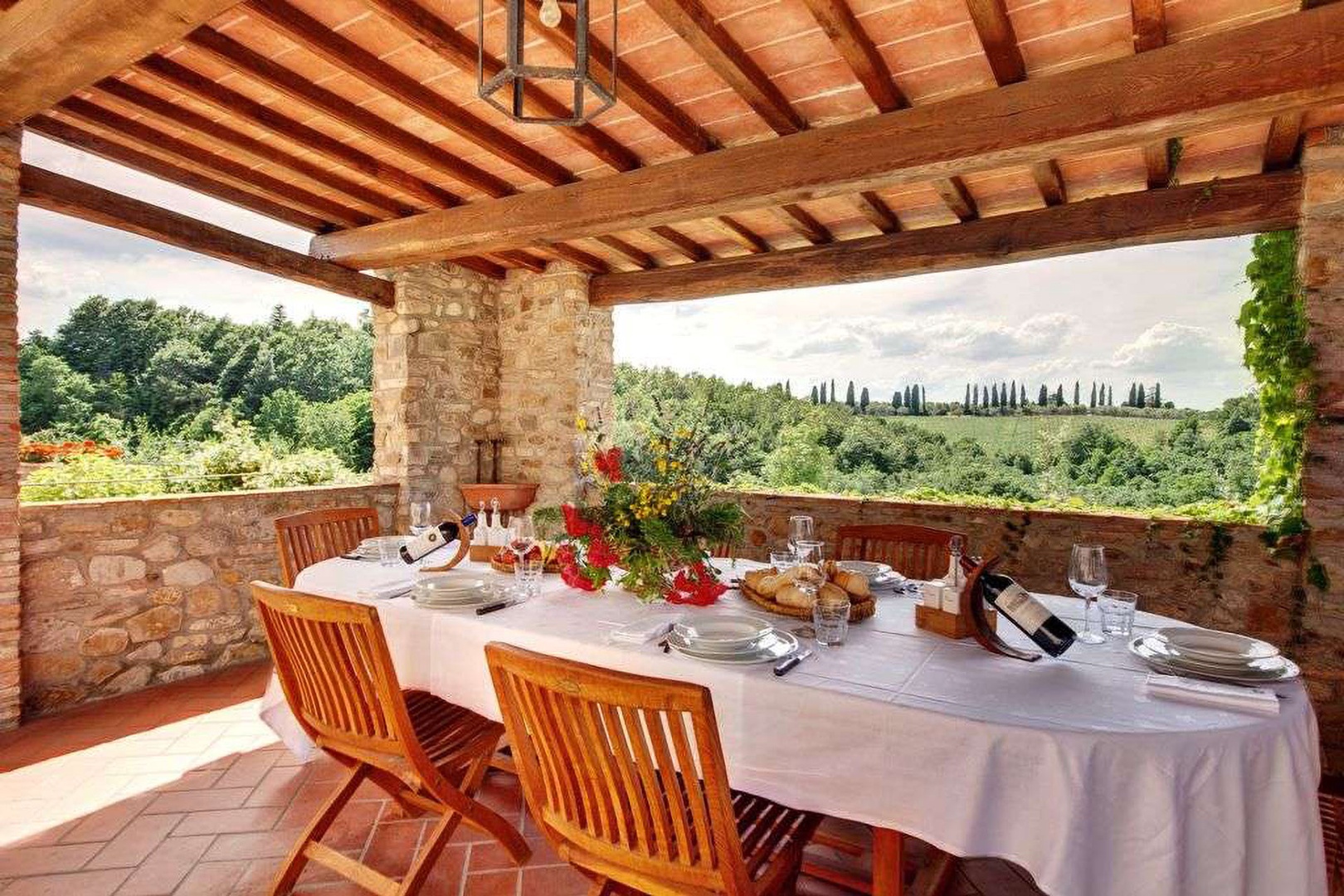 Dine outdoors in this idyllic Tuscan setting.