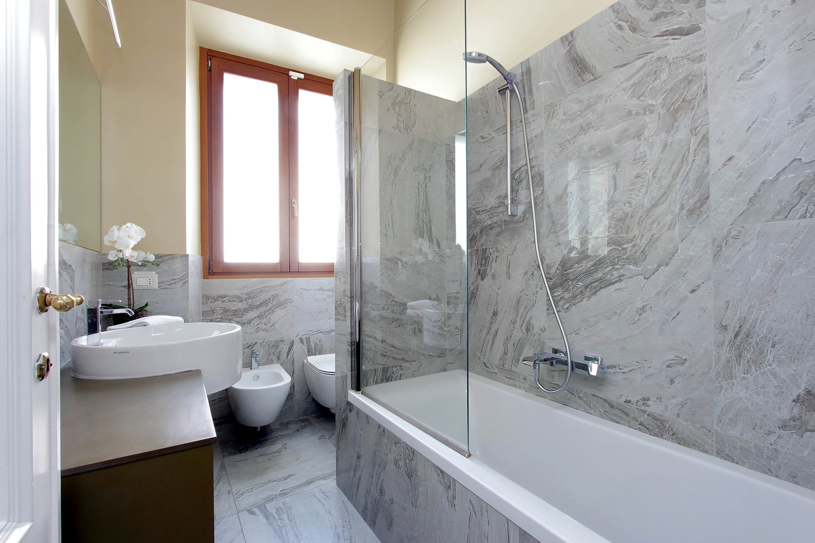 Two bathrooms provide ample space for getting ready for the day.