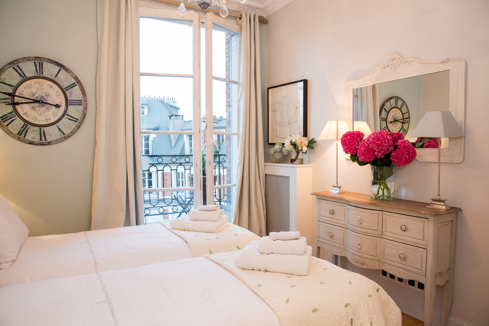 Bedroom 3 opens onto a small balcony.