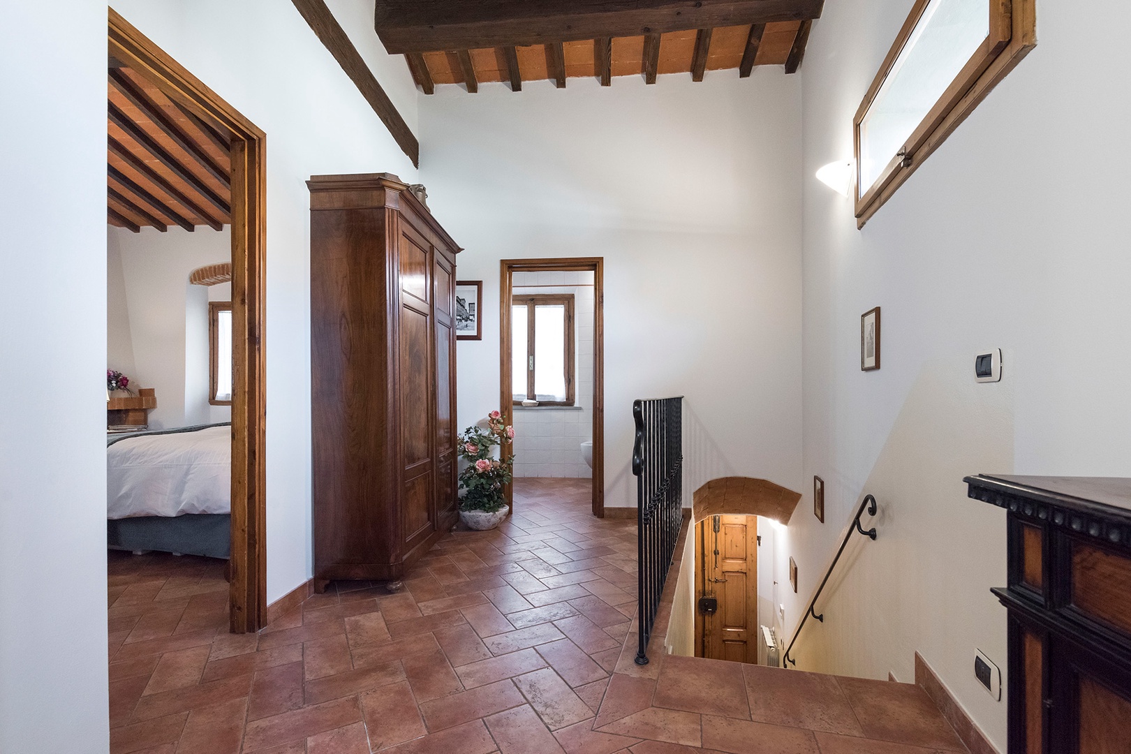 Upstairs landing, bedroom on the left, bathroom straight ahead and staircase to the right.