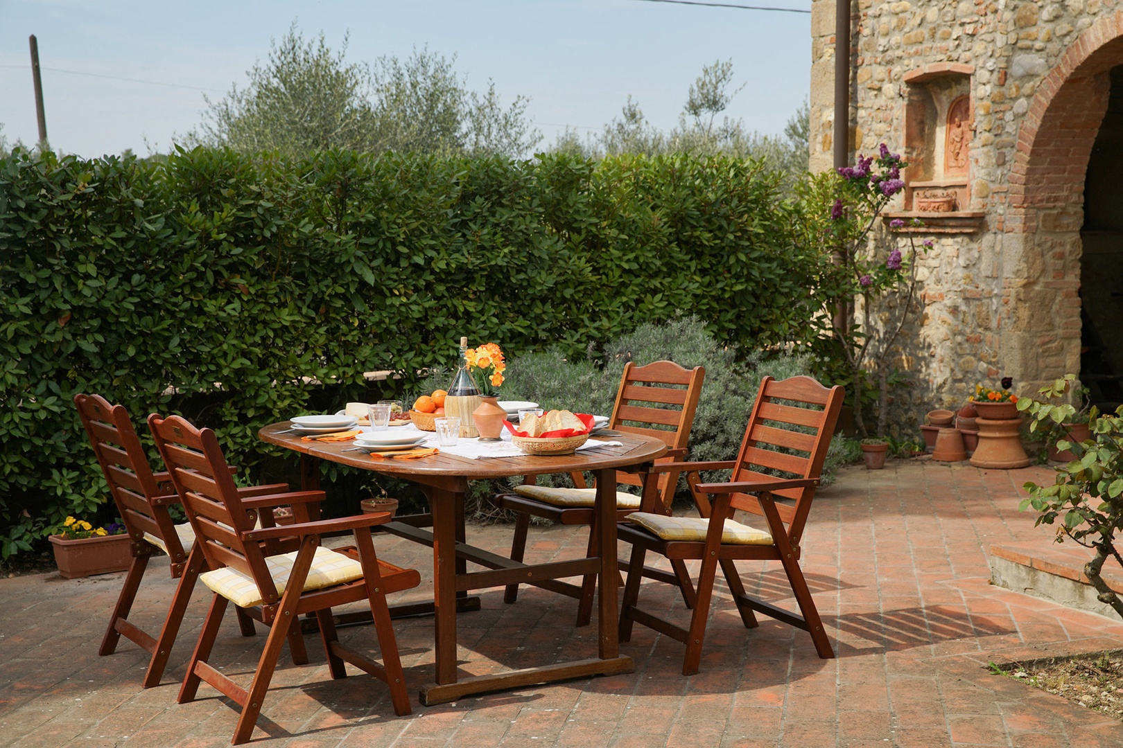 Enjoy meals al fresco on the sunny terrace at Casa San Vito.