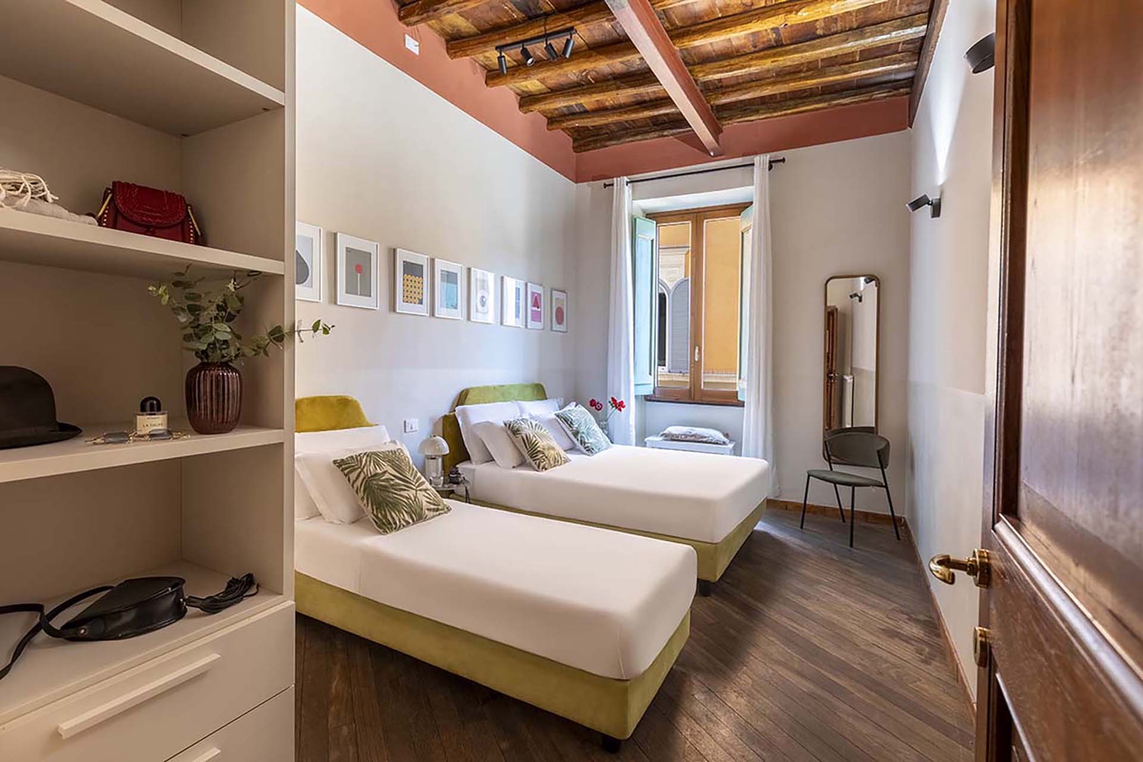 Bedroom 1 has an extra-wide queen bed and single bed.