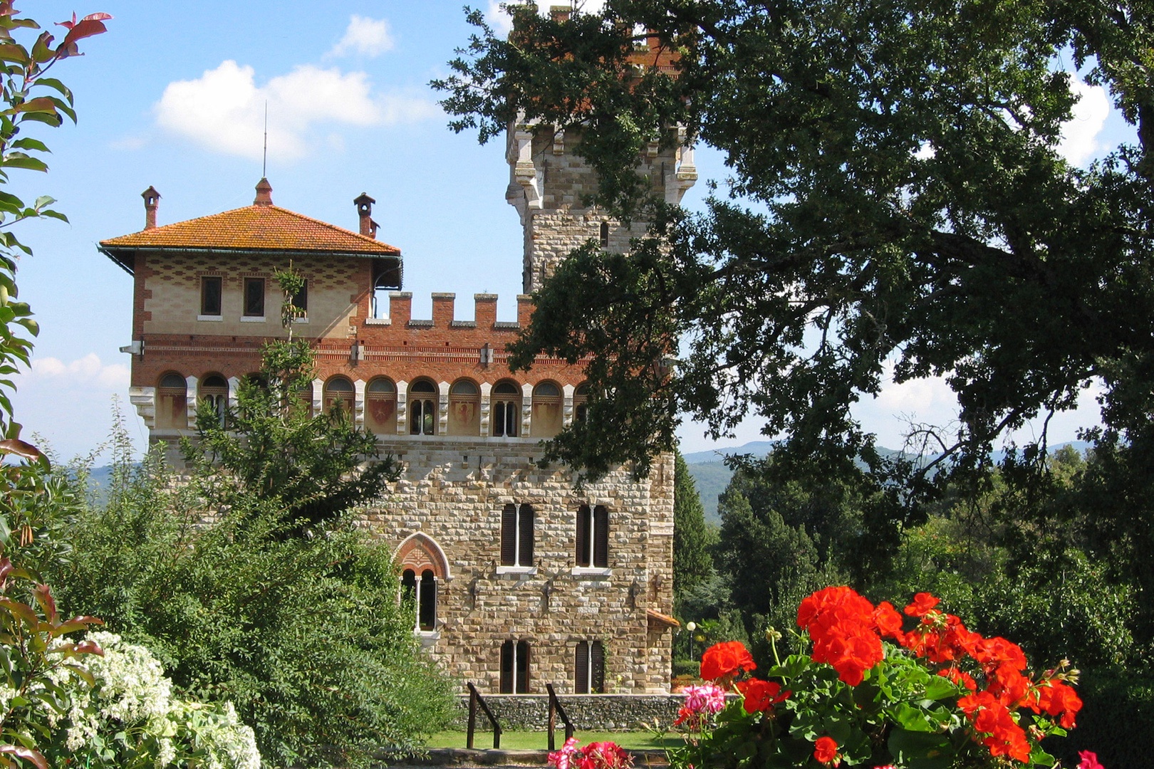 A perfect medieval castle overlooks the hamlet "Borgo" that has been turned into a vacation village