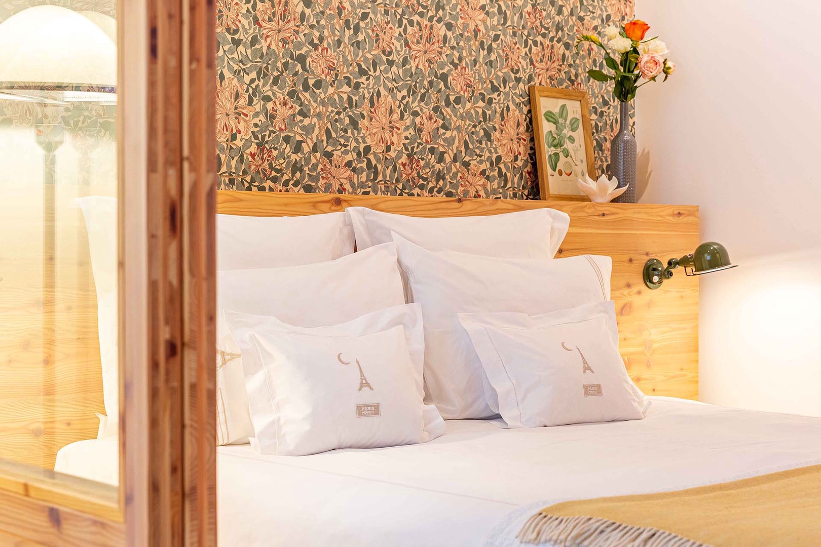 Peaceful colors and wood details in bedroom.