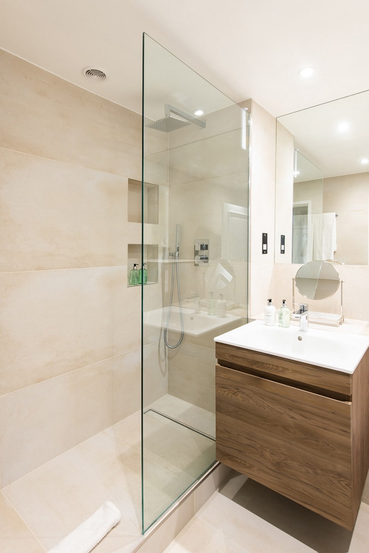 Modern bathroom with marble shower.