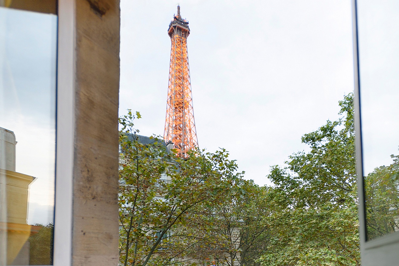 View the Eiffel Tower from the living and dining area.