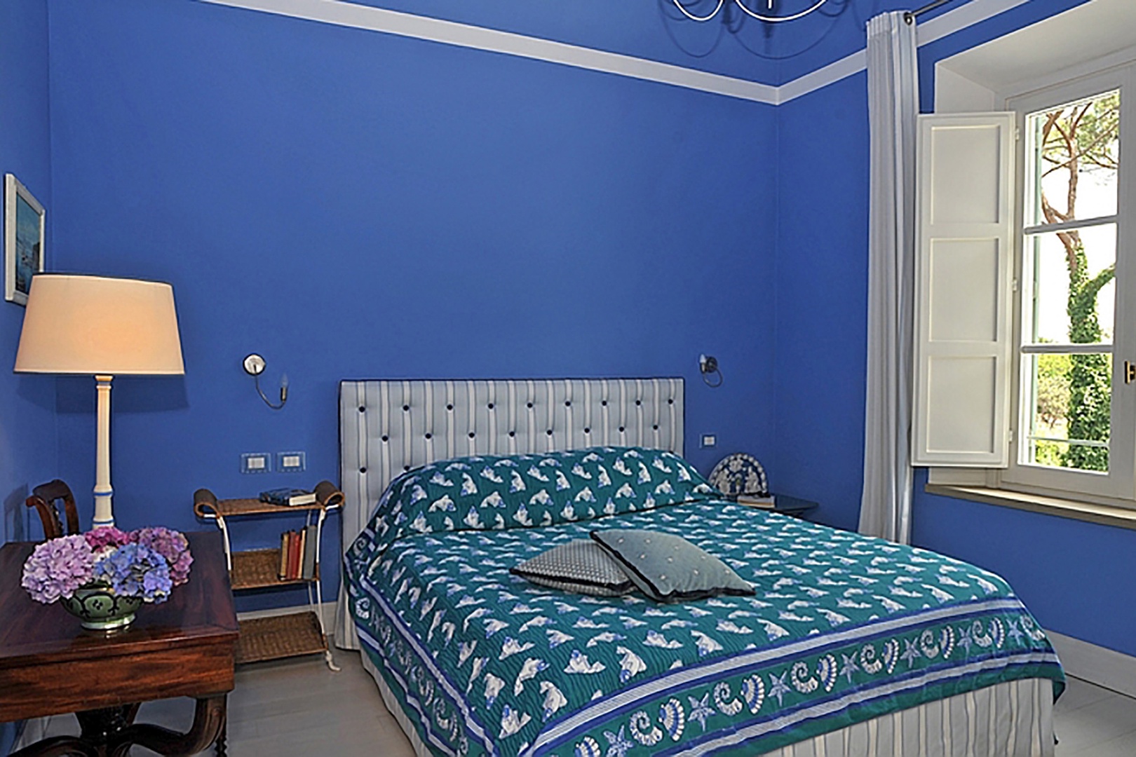 Bright and vibrant bedroom 6 gives a very Mediterranean feel.
