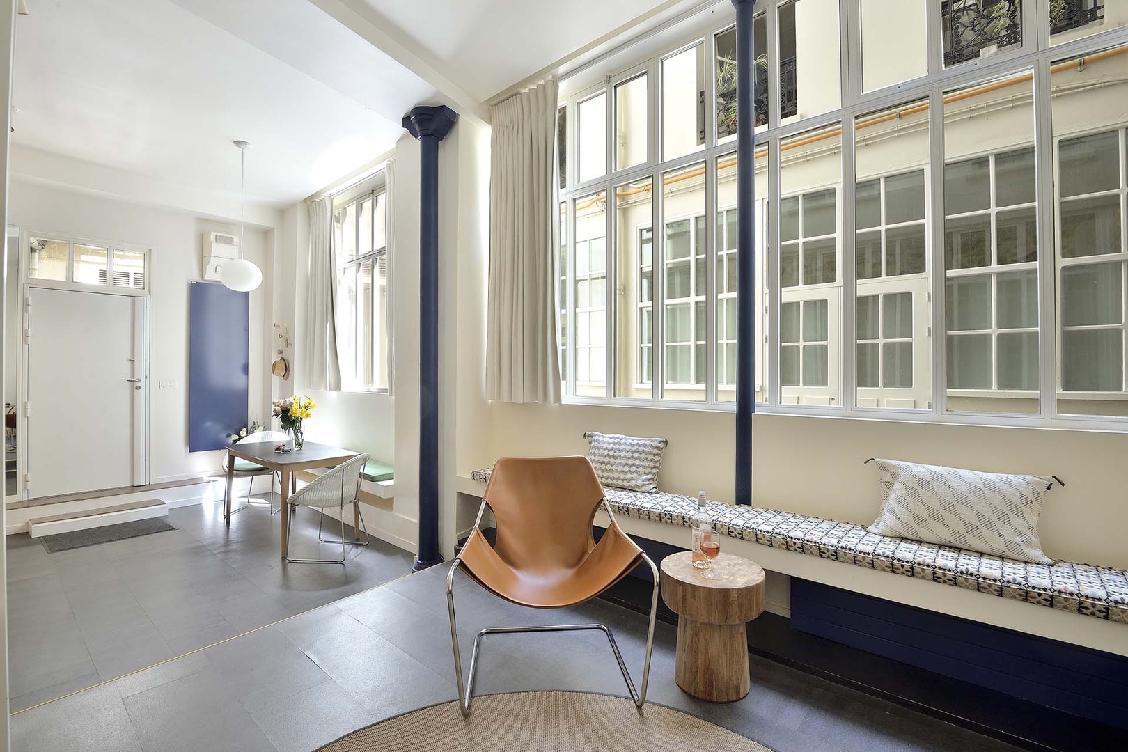 High ceilings and large windows create a lovely spaciousness.