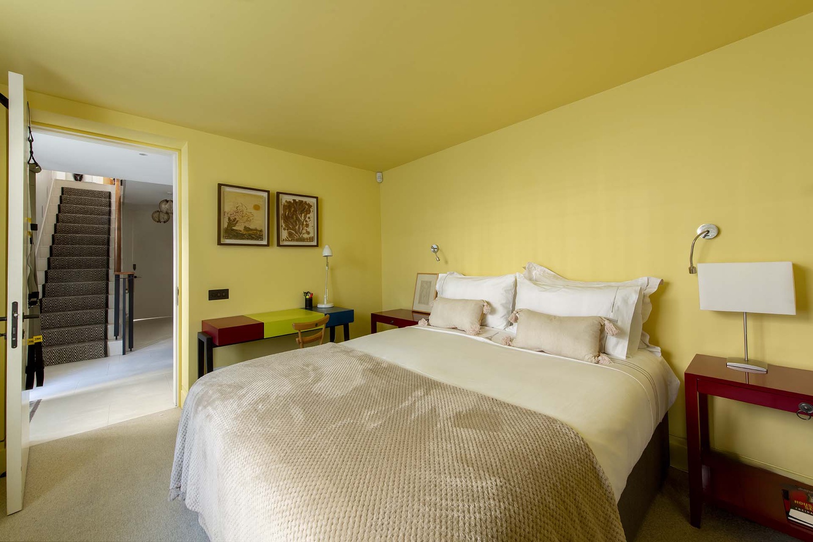 Cheerful bedroom 3 with writing desk.