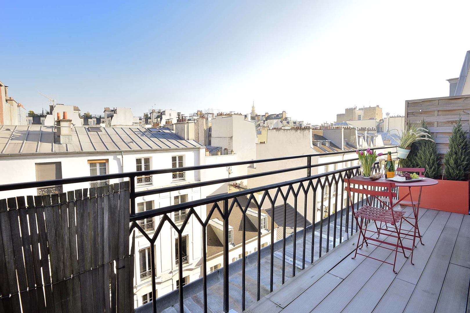 Fabulous balcony with bistro table overlooking rue Cler.