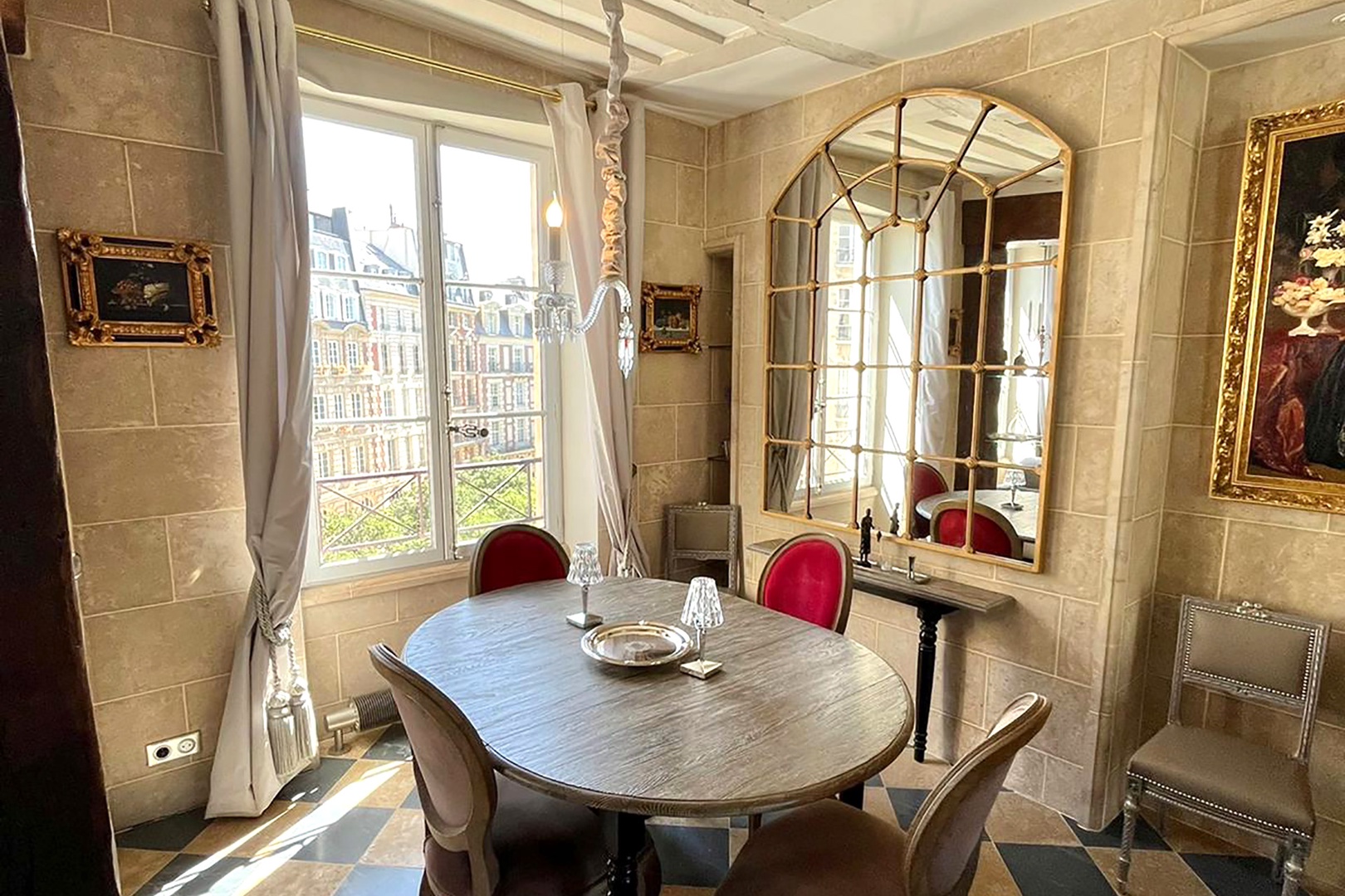 Enjoy dining at home with a view of Place Dauphine.