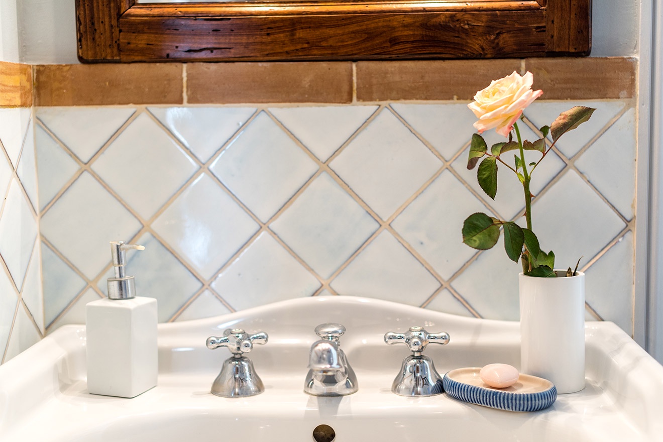 Start your day in this bright and clean bathroom.