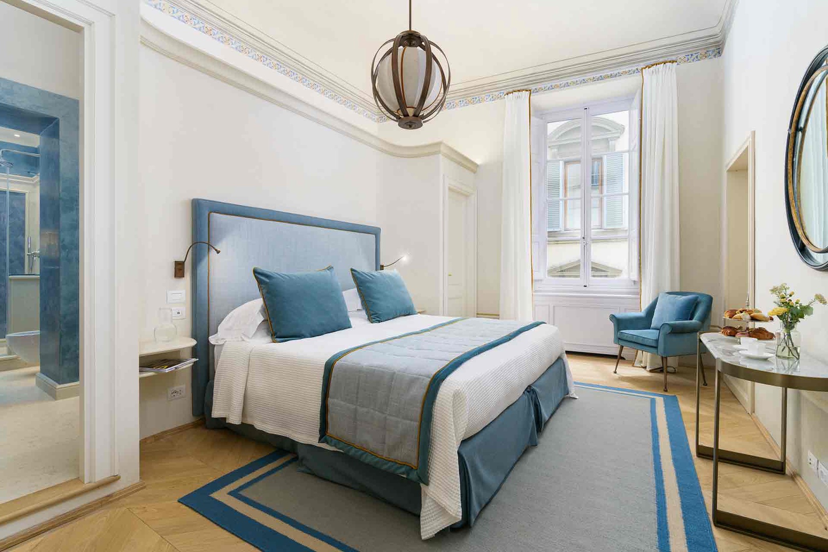 Sink into lovely bedroom 2 with plush bedding and lots of natural light.