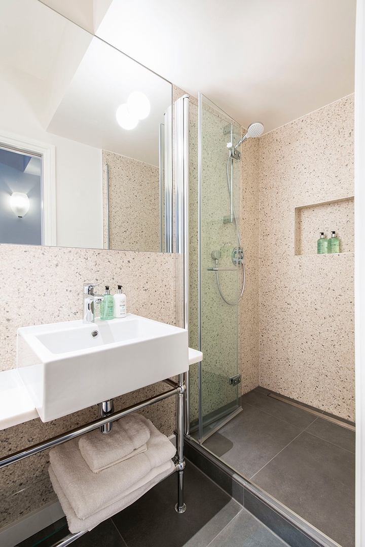 Take an energizing shower in the morning in bathroom 1.