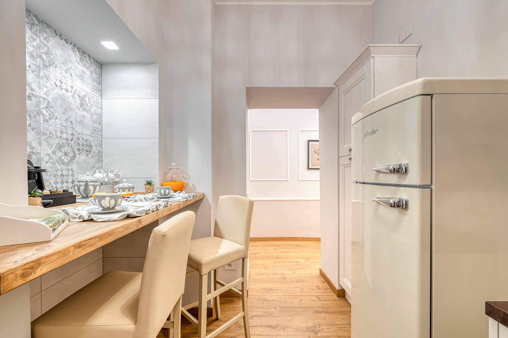 The breakfast bar in the kitchen is perfect for morning coffee or tea