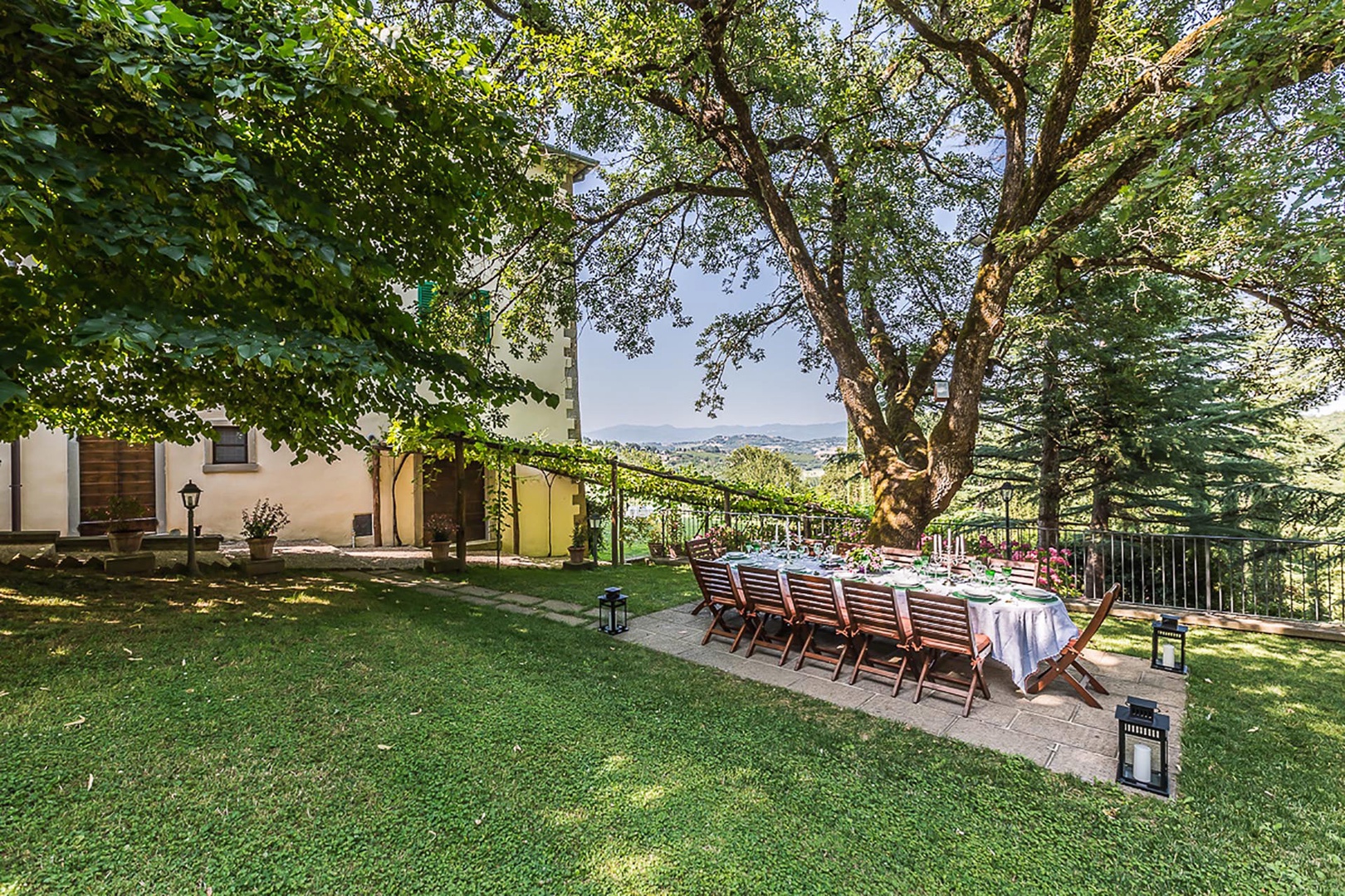 Enjoy the storybook setting of this villa while dining outside.