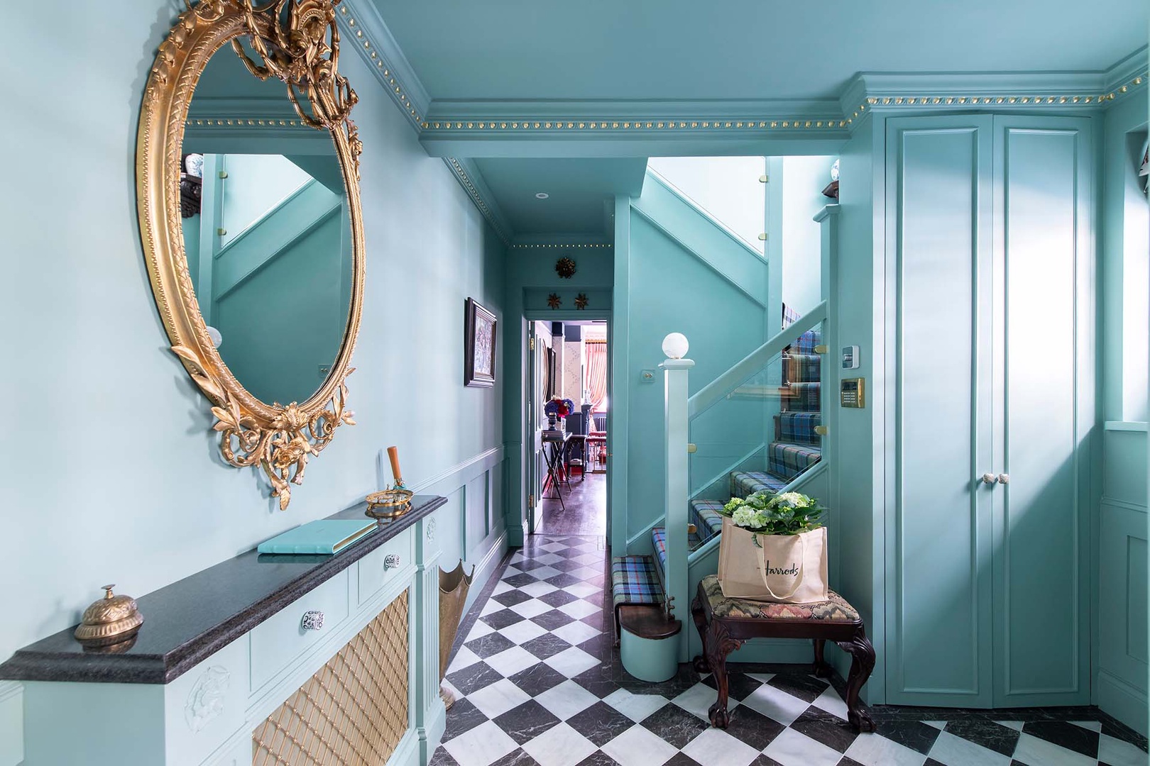 Gorgeous entryway separates living room and kitchen.