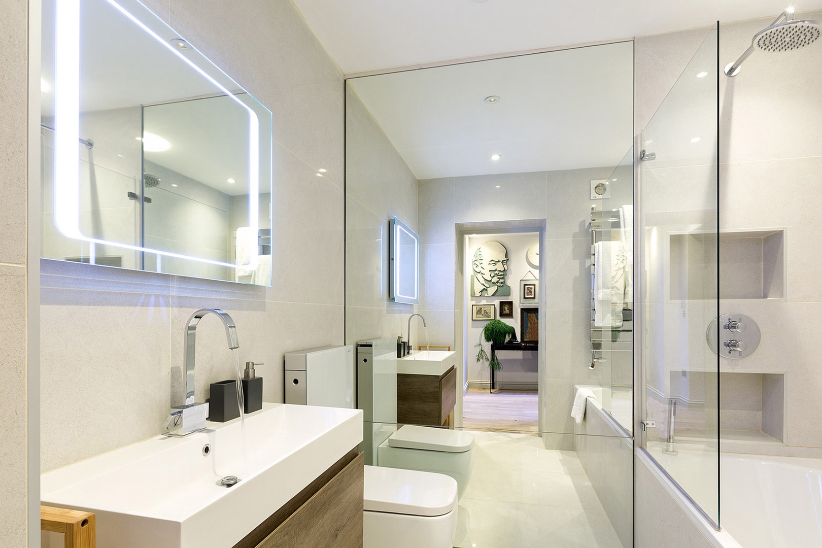 Touch-activated vanity lights in en suite bathroom 1.