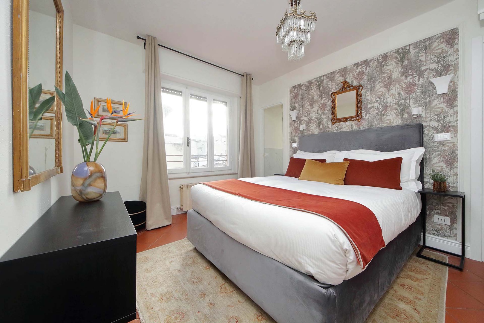 Bedroom 1 offers beautiful views of the city.