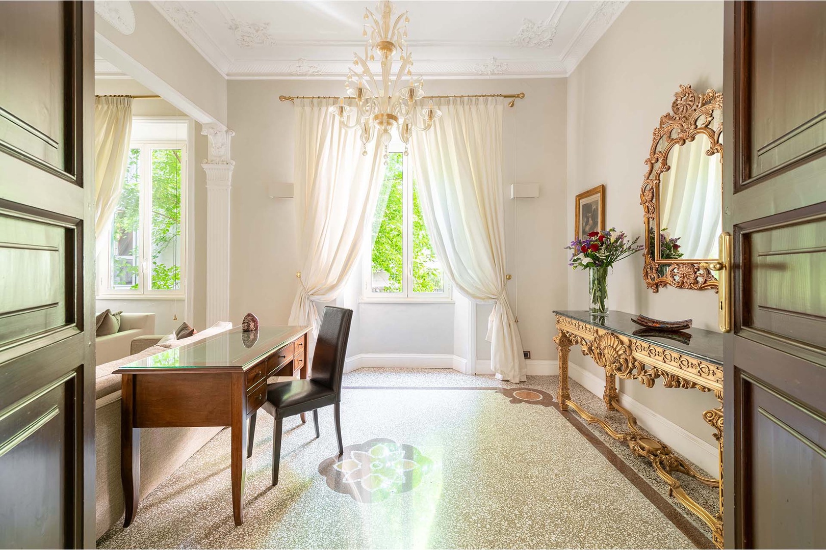 The desk area in the living room is a perfect spot to video chat or work while in Italy.