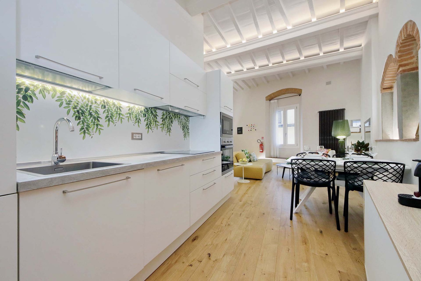 The kitchen opens up to the dining area and living room.