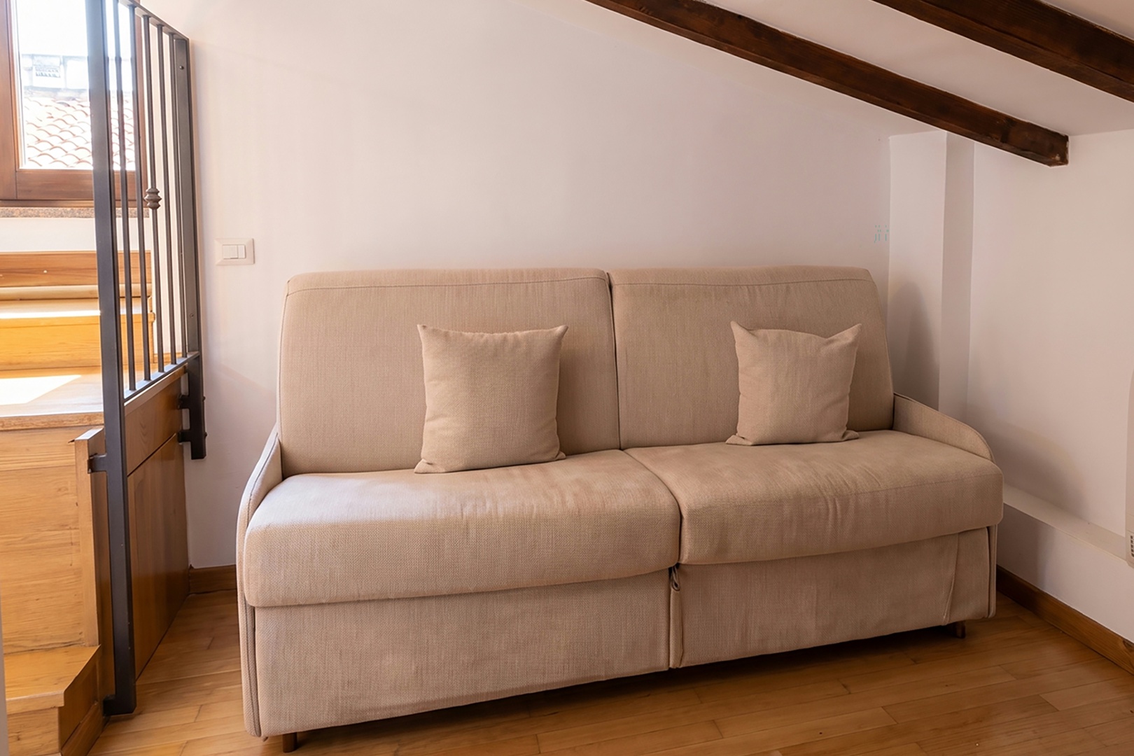 The sofa in the studio converts to a bed for extra sleeping space.