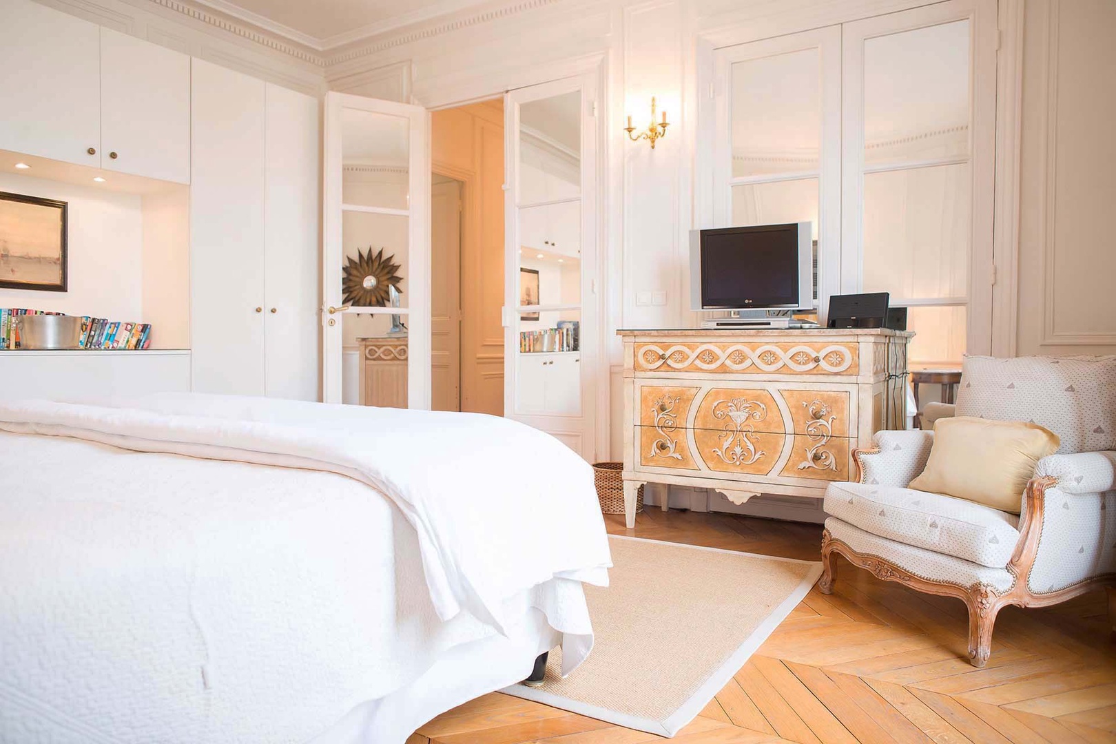 The oversized French door brightens the bedroom 1. NOTE: TV is only able to play DVD's