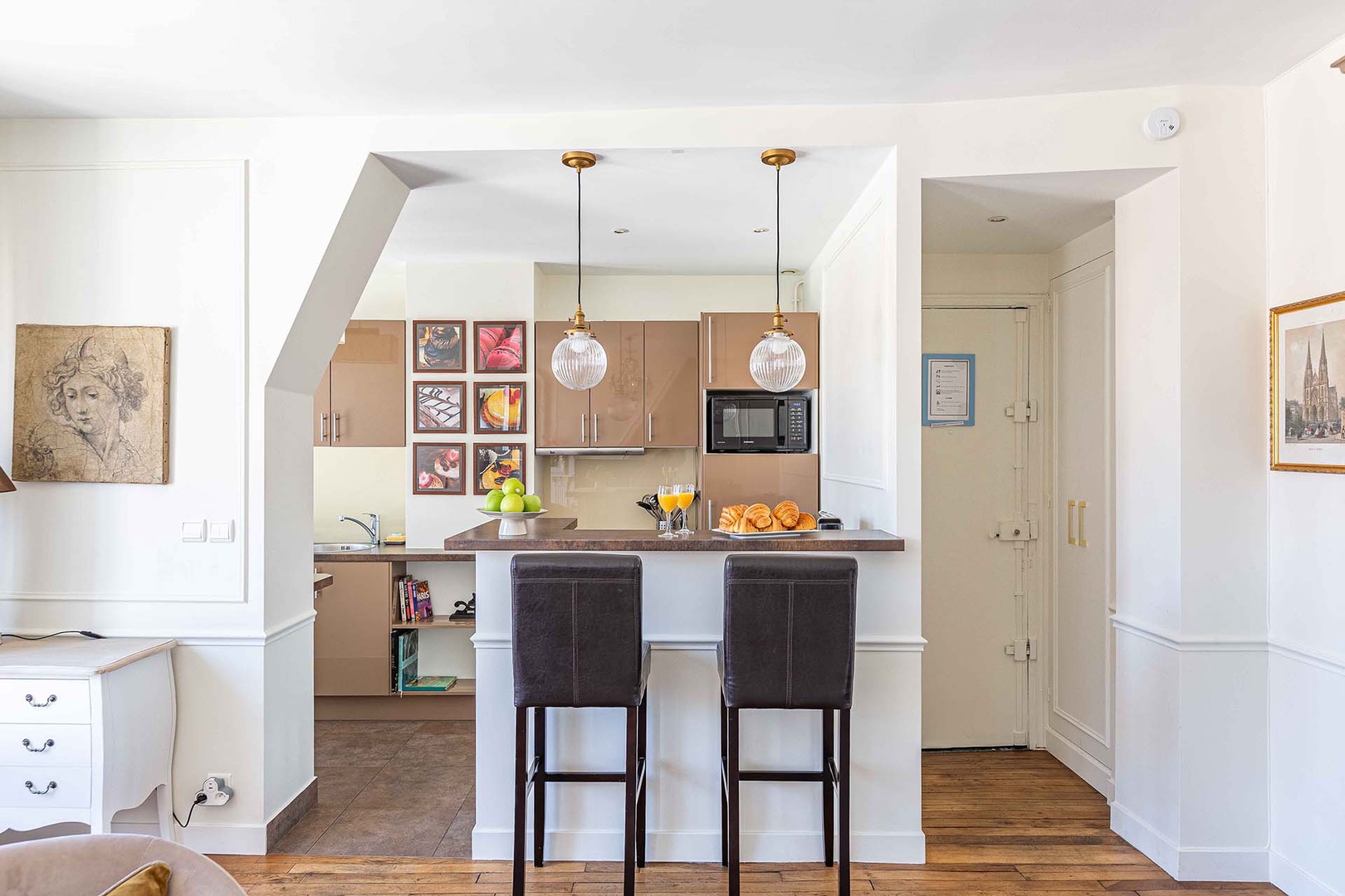 The kitchen bar is a great spot for casual meals.