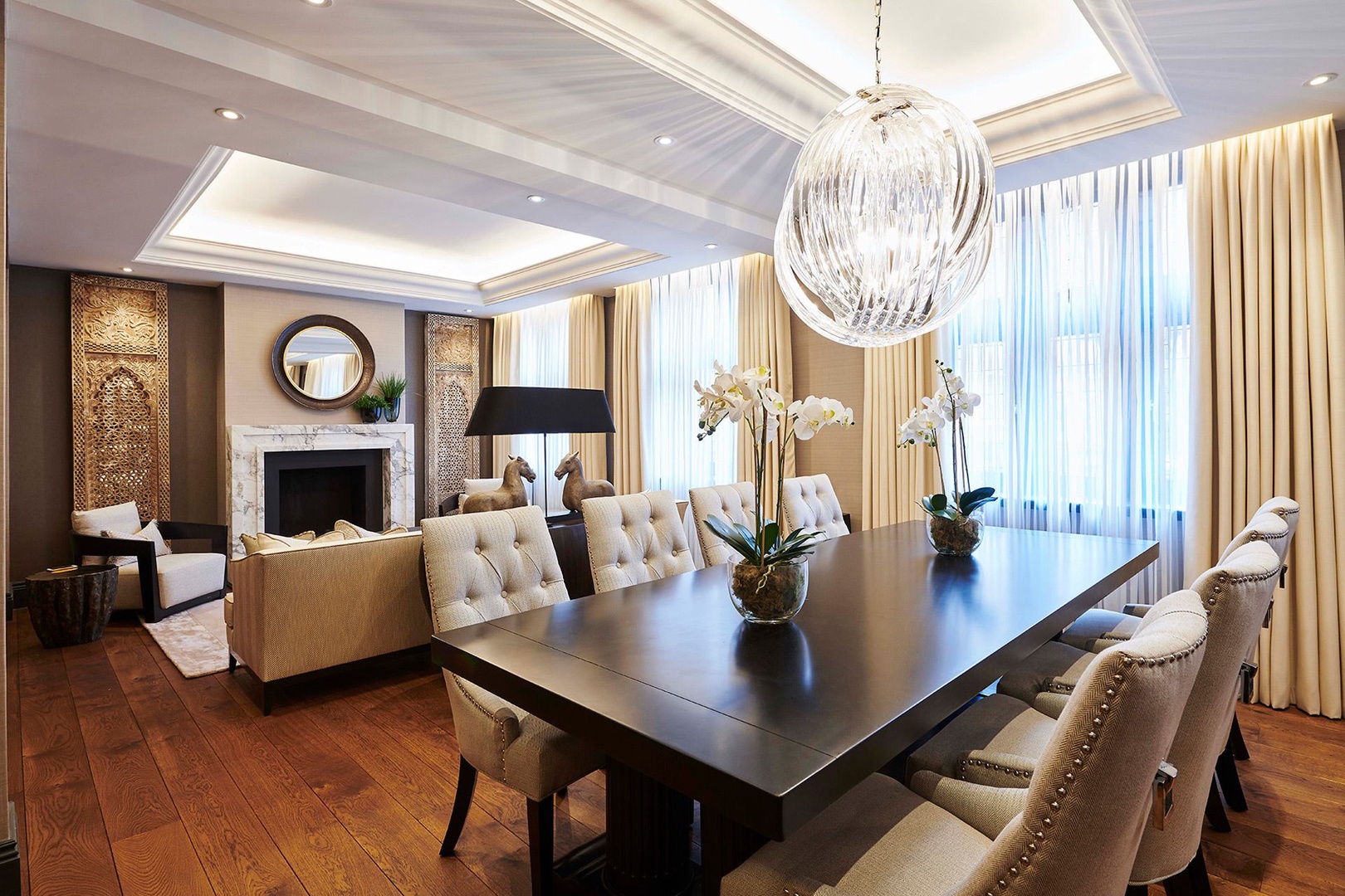Spacious living area with ornate mantelpiece