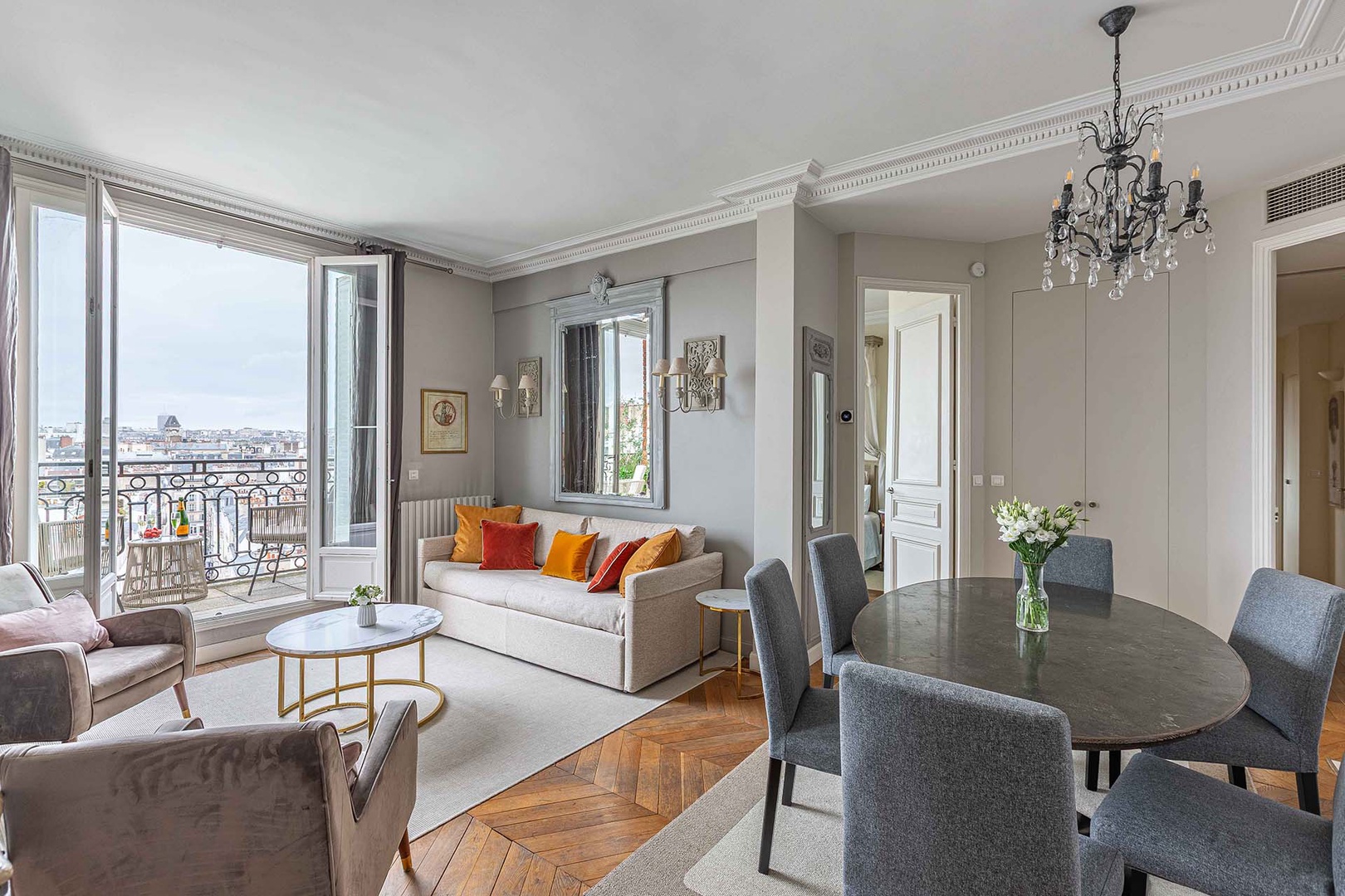 Elegant living room opening to a south-facing balcony.