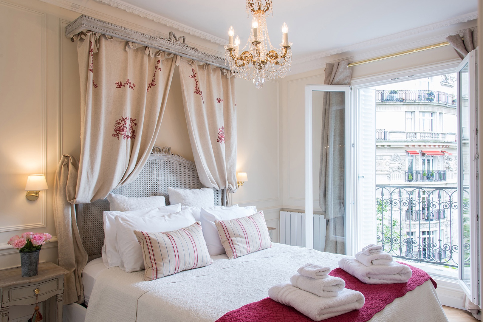 Relax in the romantic bedroom 1 with large French windows.
