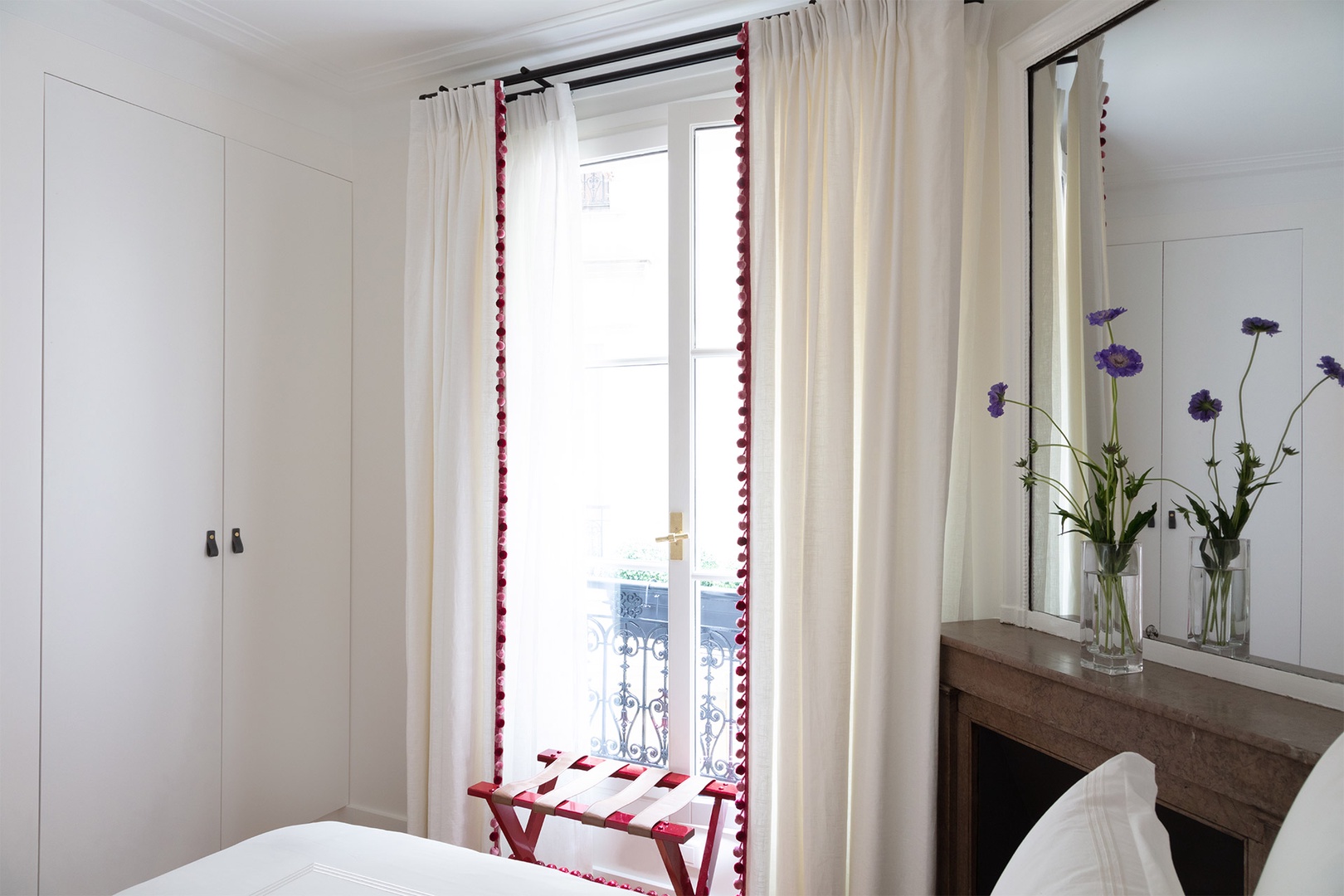 Bedroom 2 features built-in closets and courtyard views.