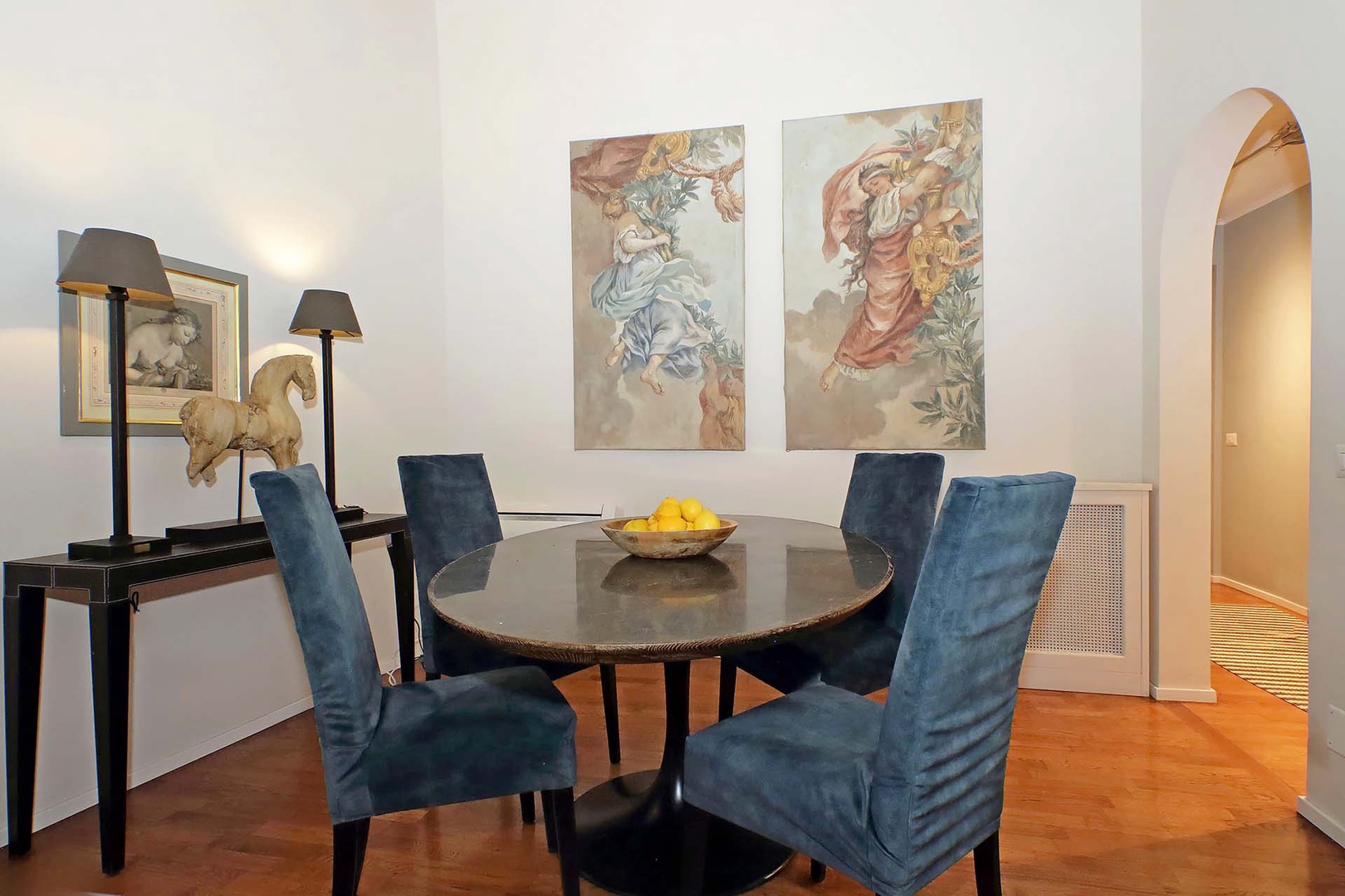 Dining area for four in the open-concept living space.